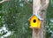 Yellow birdhouse