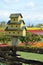 Yellow birdhouse in garden