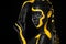 Yellow and black body paint. Woman with face art. Young girl with colorful bodypaint. An amazing afro american model