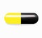 Yellow and black capsules medicine