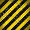 Yellow and black diagonal stripes background texture