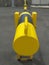 Yellow and black Roadblock Road Barrier perspective view. Metal security barrier. Fixed gate barrier. Beaconing and signaling