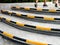 Yellow and black stripes safety symbols at the edge of the stairs