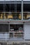 Yellow and black tuk-tuks parked on the first floor above a tiny convenient store in Lian, the Philippines