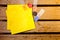 Yellow blank paper with i love you alphabet on wood pettern