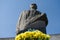 Yellow and blue flowers at monument to Sergei Korolyov