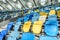 Yellow and blue stadium seats and stadium stairs