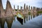 yellow boat on lake with jute