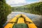 Yellow boat nose on the still waters of the Danube River.