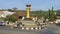 The yellow Bokor Monument is one of the symbols of the Kuningan area, with a blue sky as a background