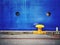 Yellow bollard and blue hull