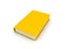 Yellow book on white surface