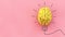 yellow brain on pink background
