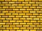 Yellow brick with black mortar.