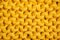 Yellow bright thick knitted fabric