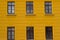 yellow building brown windows