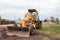 Yellow bulldozer with bucket. Wheel Loader. Heavy Equipment Machine. Tractor Front Loader. Construction Machinery