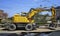 Yellow Bulldozer in movement on construction site