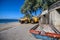 A yellow bulldozer works on the Costa Adeje beach. 08.01.2020 Tenerife, Canary Islands