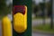 Yellow button in Braille to navigate the crosswalk. press the button to change the color of traffic lights, safety of pedestrians