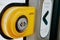 Yellow button for opening doors in public transport