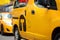 Yellow cab cars in traffic on Times Square in Manhattan, New York, USA