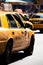 Yellow cab speeds through Times Square in New York.