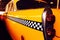 Yellow Cab Taxi, Color detail on the back light of Taxi Checker