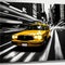 Yellow cab, taxicab riding fast in New York