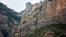 Yellow cable car in the Aeri de Montserrat rise to de Montserrat Abbey near Barcelona, Spain, Catalonia.