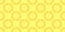 yellow candies are laid out in circles on a seamless banner. Picture for wrapping paper or ceramic tiles