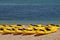 Yellow canoes on the beach