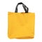 Yellow canvas shopping bag isolated on white