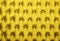 Yellow capitone tufted fabric upholstery texture