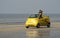 Yellow Car on Beach for action and speed sport for tourists