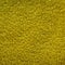 Yellow carpet material with loose threads, abstract background texture