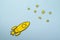 Yellow cartoon rocket flying through space with copy space