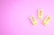 Yellow Cartridges icon isolated on pink background. Shotgun hunting firearms cartridge. Hunt rifle bullet icon
