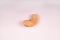 yellow cashew nut on white surface