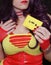 Yellow Cassette Tape With Woman in Retro clothing in background