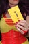 Yellow Cassette Tape With Woman in Retro clothing in background