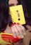 Yellow Cassette Tape With Woman in Retro clothing in background