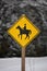 Yellow Caution Horse Riding Sign in a Rural Setting in Winter