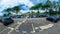 Yellow central line of parking lot area with cars view