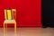 Yellow chair gift in the interior of the red room