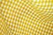 Yellow checkered tablecloth texture - image