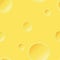 Yellow cheese with holes seamless pattern