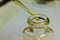 Yellow chemical transparent liquid in pipette tip dropping to cl