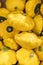 Yellow chestnut. Colorful pumpkins. Bright patissons on the market. Yellow patissons. backgrount. vertical photo.