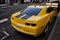 Yellow Chevrolet sport car parking